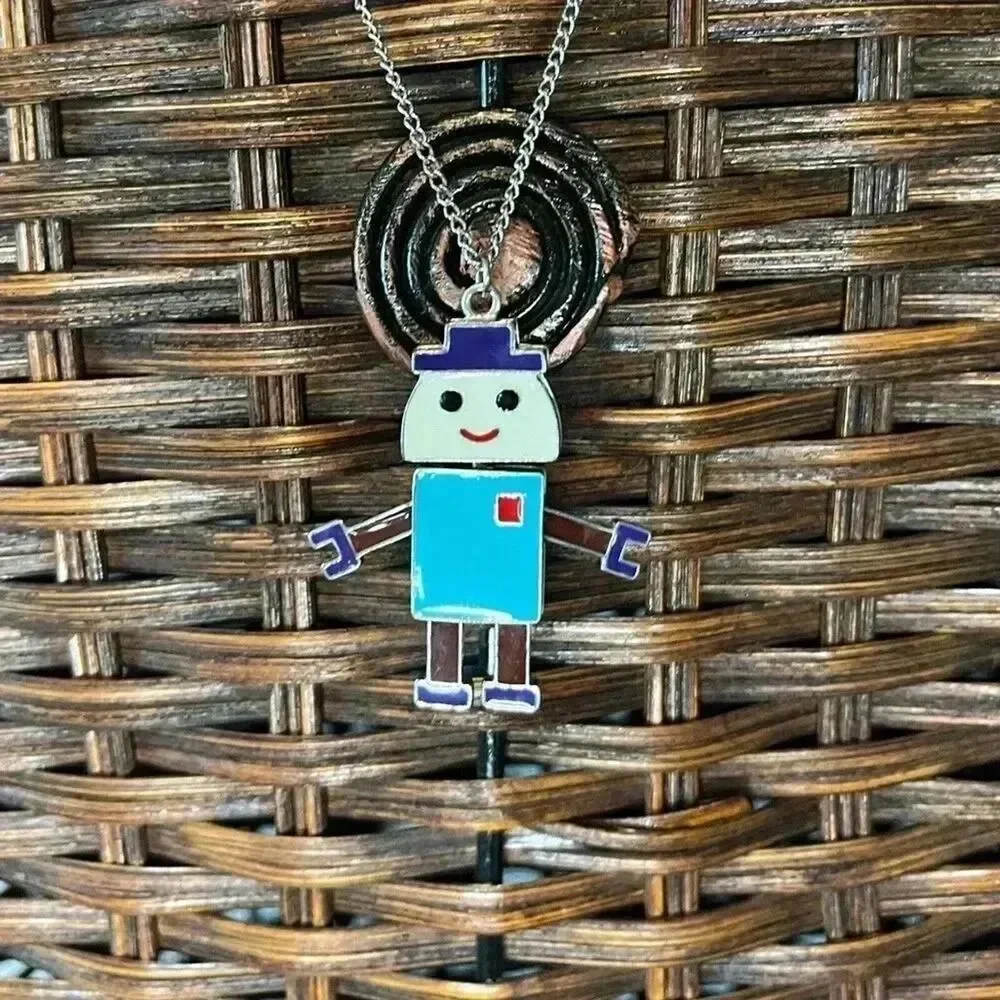 Articulating robot necklace on a silver tone chain